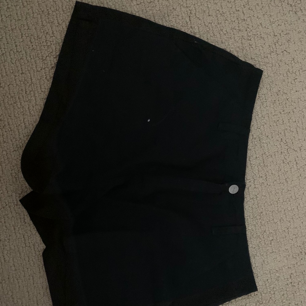Black shorts.